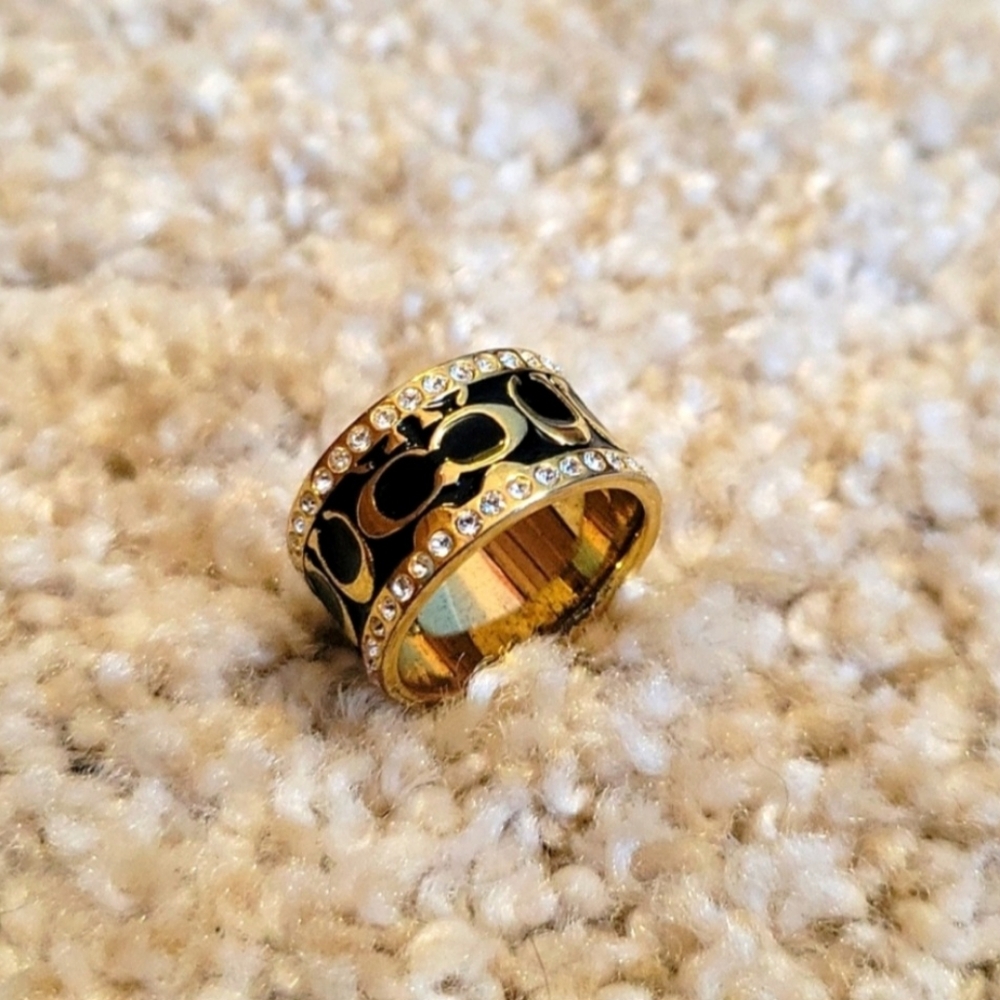 Beautiful detailed Coach ring. No flaws. Excellent price for this.